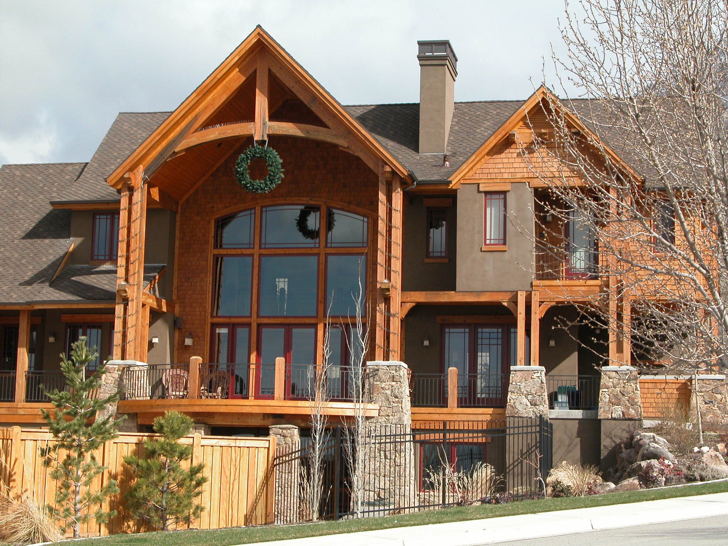 Custom timberframe home with stone and reclaimed wood